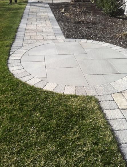 Brick and stone walkway - brick pavers, walkways and patios landscaping services - Stellato Bros. Inc. in Feeding Hills, MA