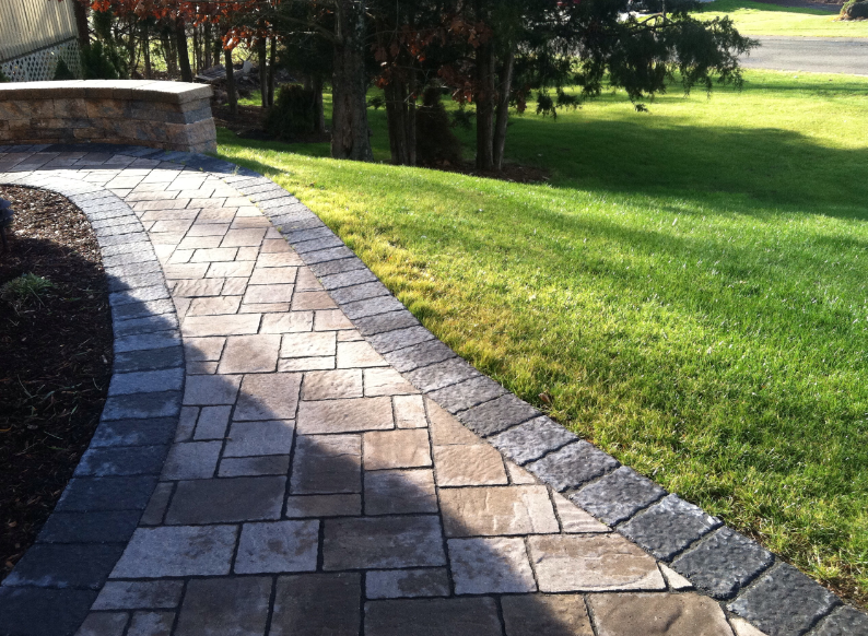 Brick and stone walkway - brick pavers, walkways and patios landscaping services - Stellato Bros. Inc. in Feeding Hills, MA