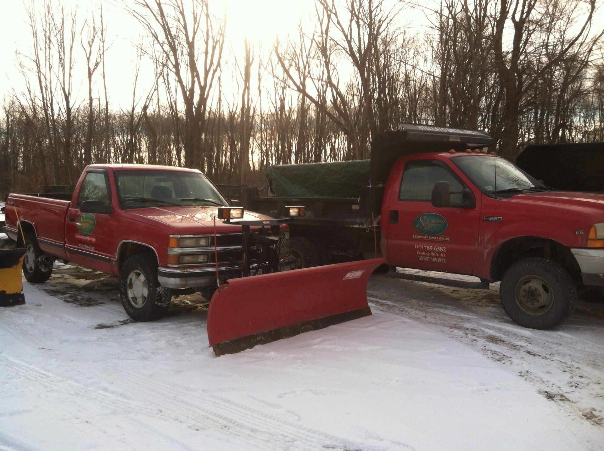 Service vehicles with snow plow capabilities - landscaping services - Stellato Bros. Inc. in Feeding Hills, MA