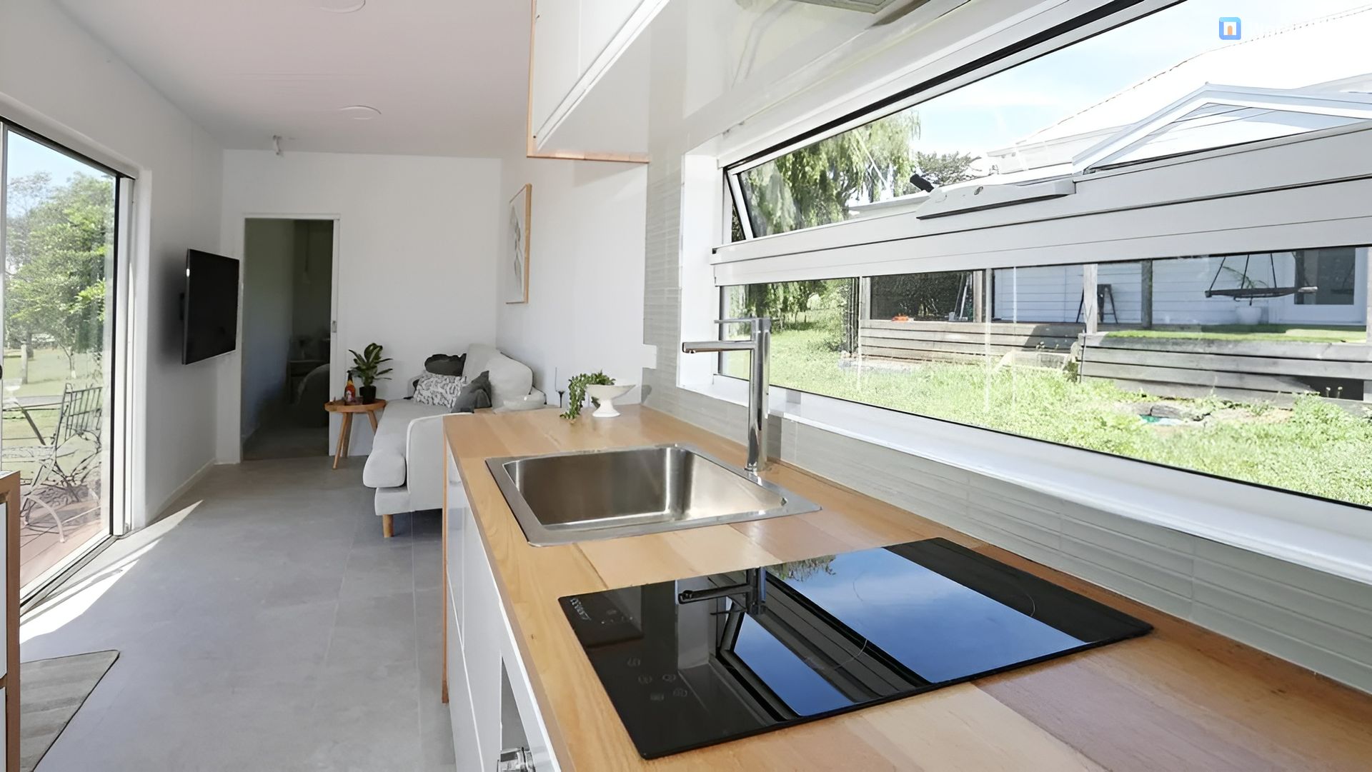 Two Men Sitting On Top Of A Newly Built House Container — GTH Living In Geelong, VIC