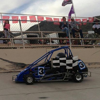 A go kart with the number 3 on it