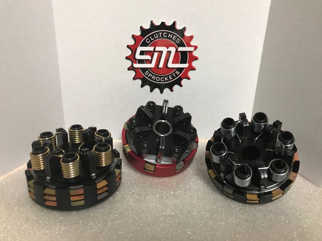 Three pieces of metal are sitting next to each other on a table.