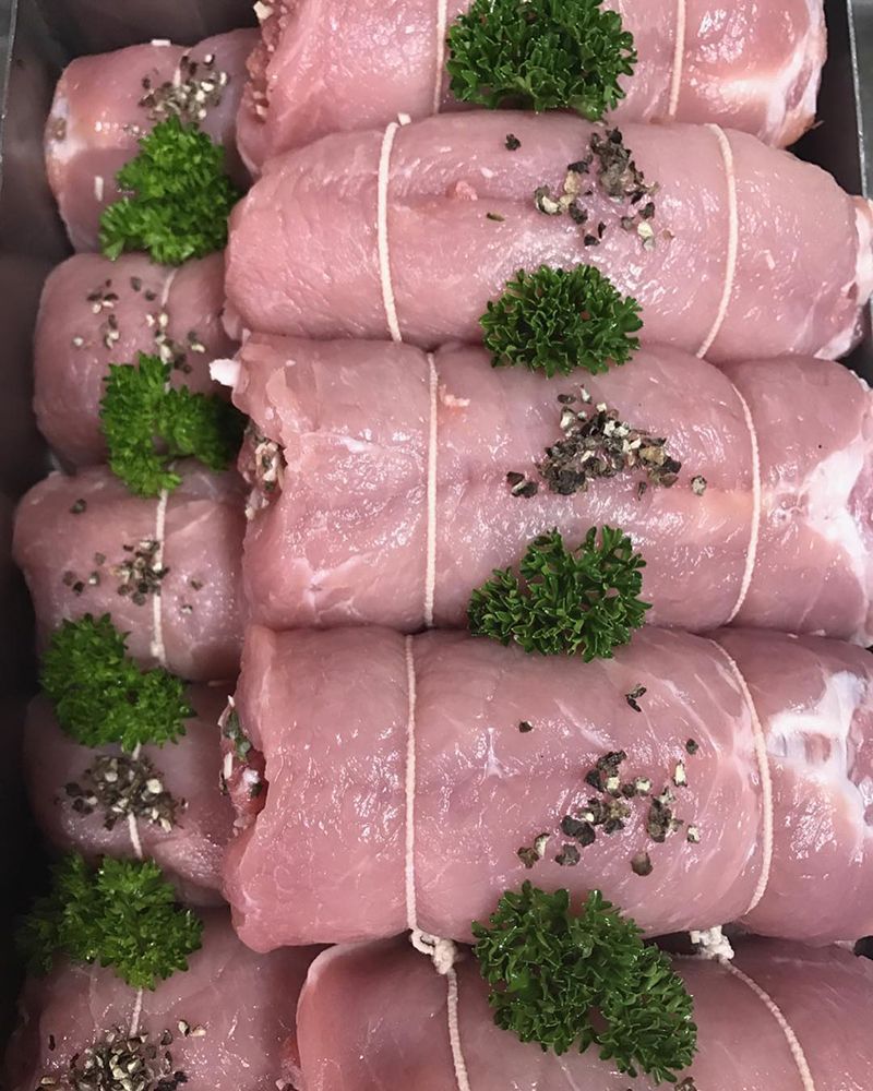 A Bunch of Meat Rolls With Parsley on Top — Nambour Heights Butchery in Nambour, QLD