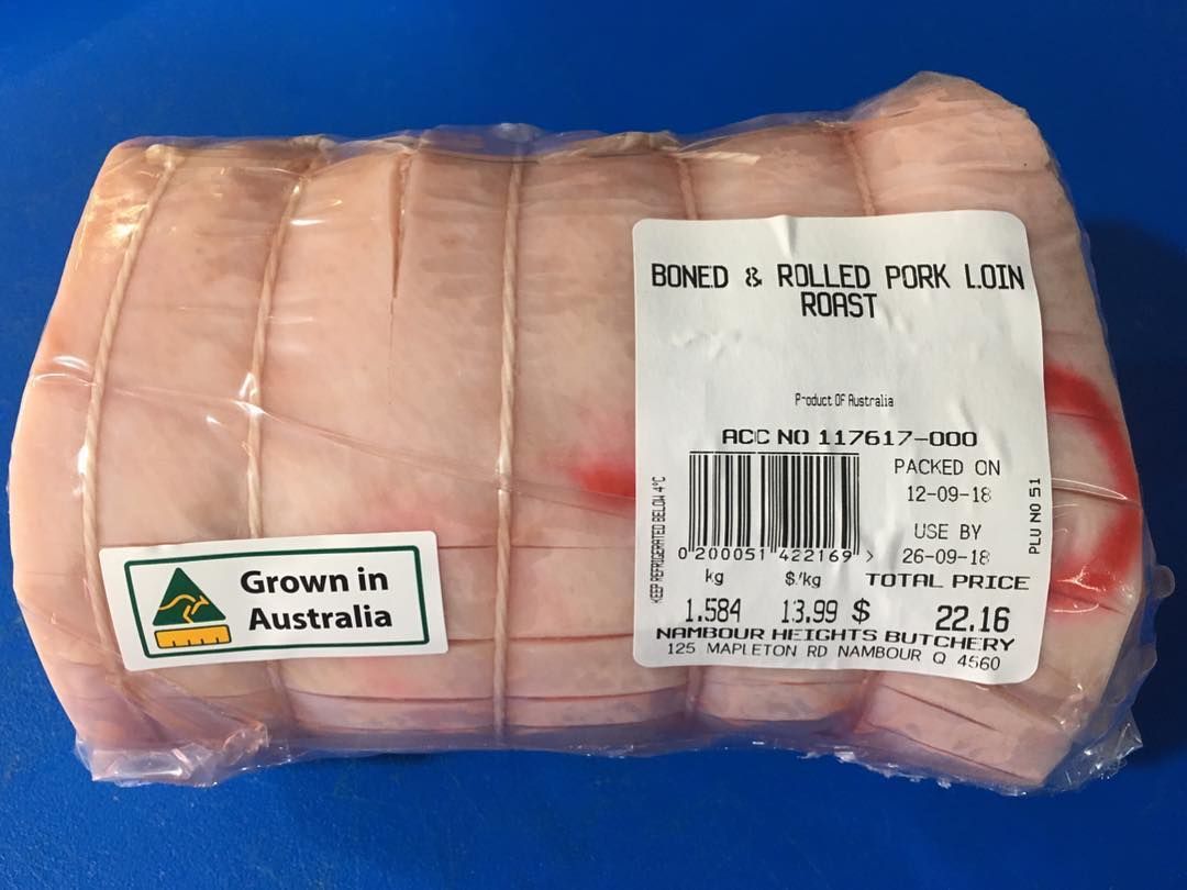 A Piece of Pork is Wrapped in Plastic — Nambour Heights Butchery in Nambour, QLD