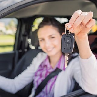 Auto — Woman Holding Key, in Gorda, FL