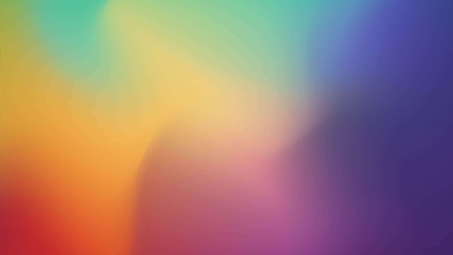 Colorful blurred gradient background: red, orange, yellow, green, blue, and purple hues.