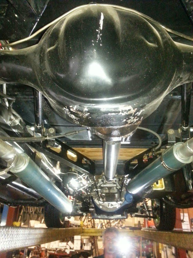 Brake Hose and Line Replacement — Black Rotor Under Car in Everett, WA