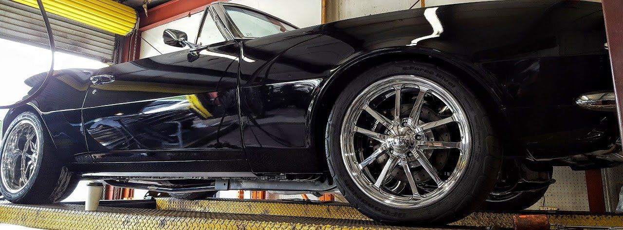 Performance Mufflers — Car Dark Colored in Everett, WA