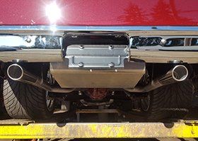 Performance Mufflers — Red Car with Dual Exhausts in Everett, WA