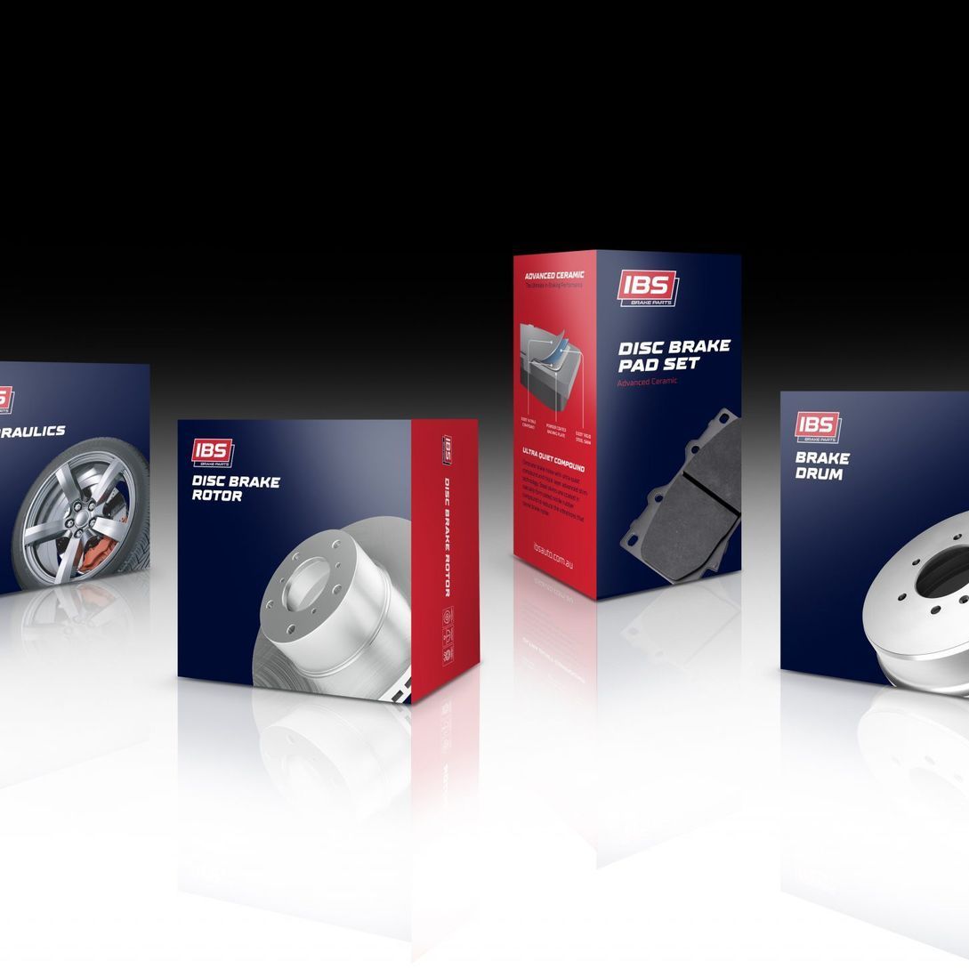 several boxes of brake parts are lined up on a table