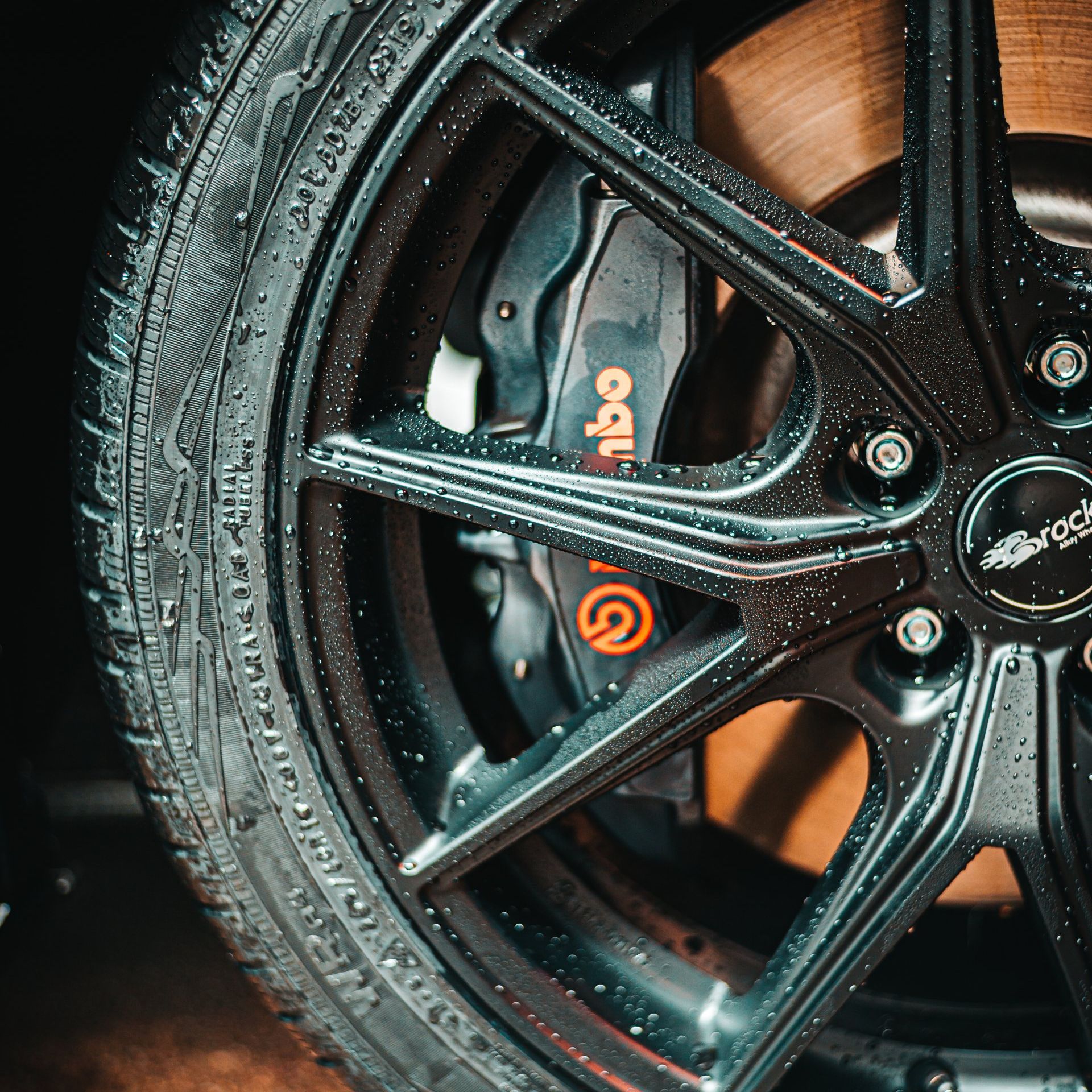 a close up of a brembo brake on a car wheel