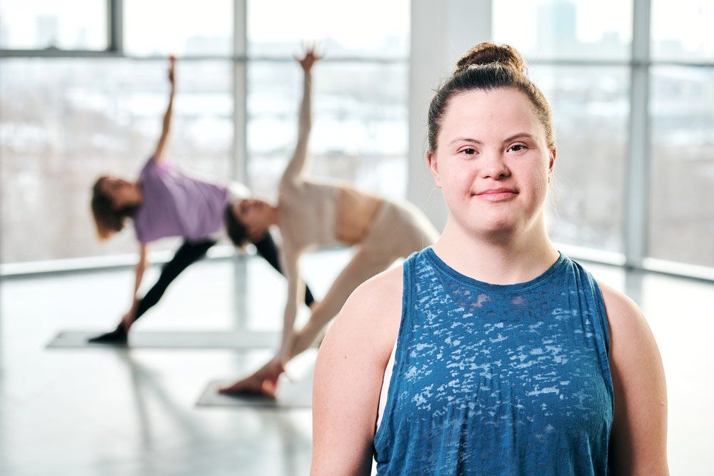 Happy Young Woman at Aerobics Class — Better Access Support Services In Wyreema, QLD
