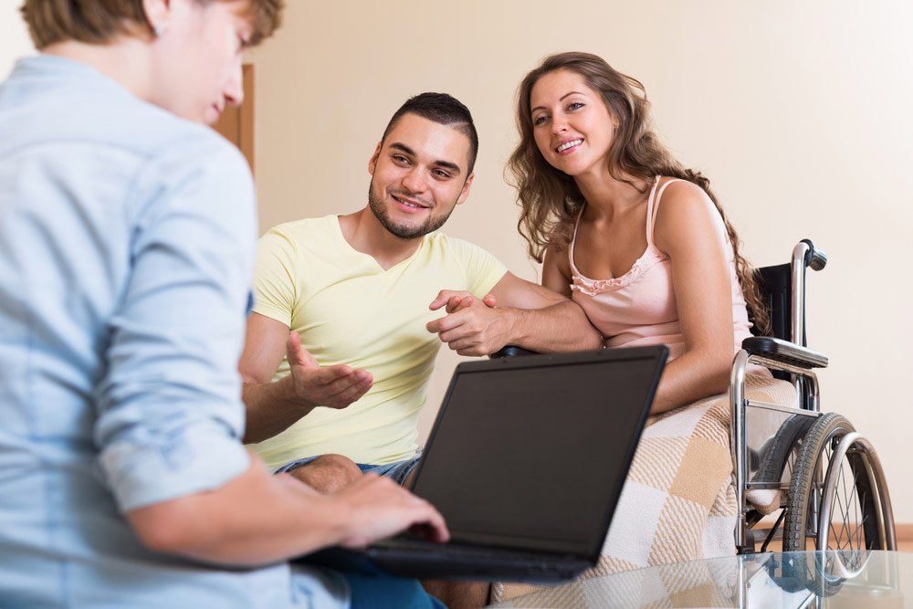Young Couple Having a Discussion — Better Access Support Services In Wyreema, QLD