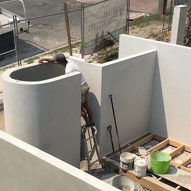 Mason Working Wall — Venetian Plastering & Cladding Services in Balina, NSW