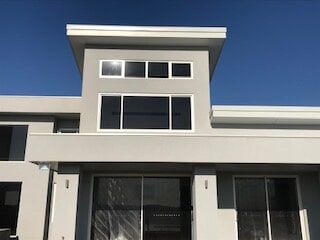 Modern House Cement Rendering — Venetian Plastering & Cladding Services in Balina, NSW