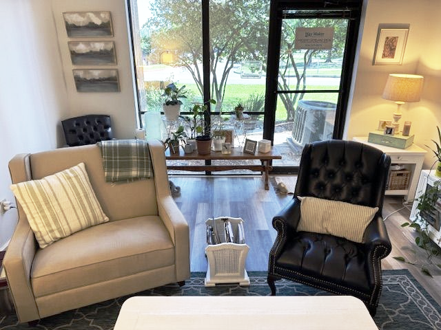 Female psychologist looking at webcam of tablet