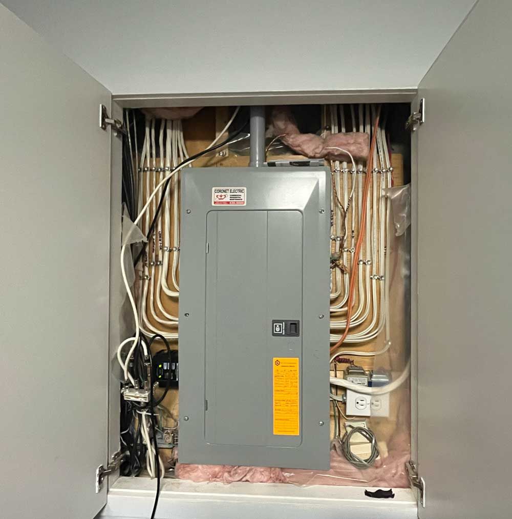 Solar panel installer works on a roof. Blue sky.