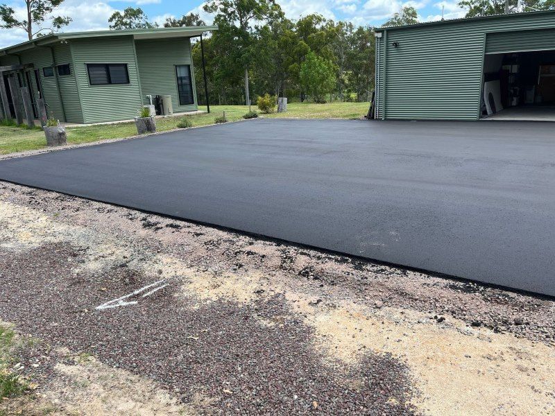 Freshly Paved Ashpalt — Roll Formed Driveways in Yandina, QLD