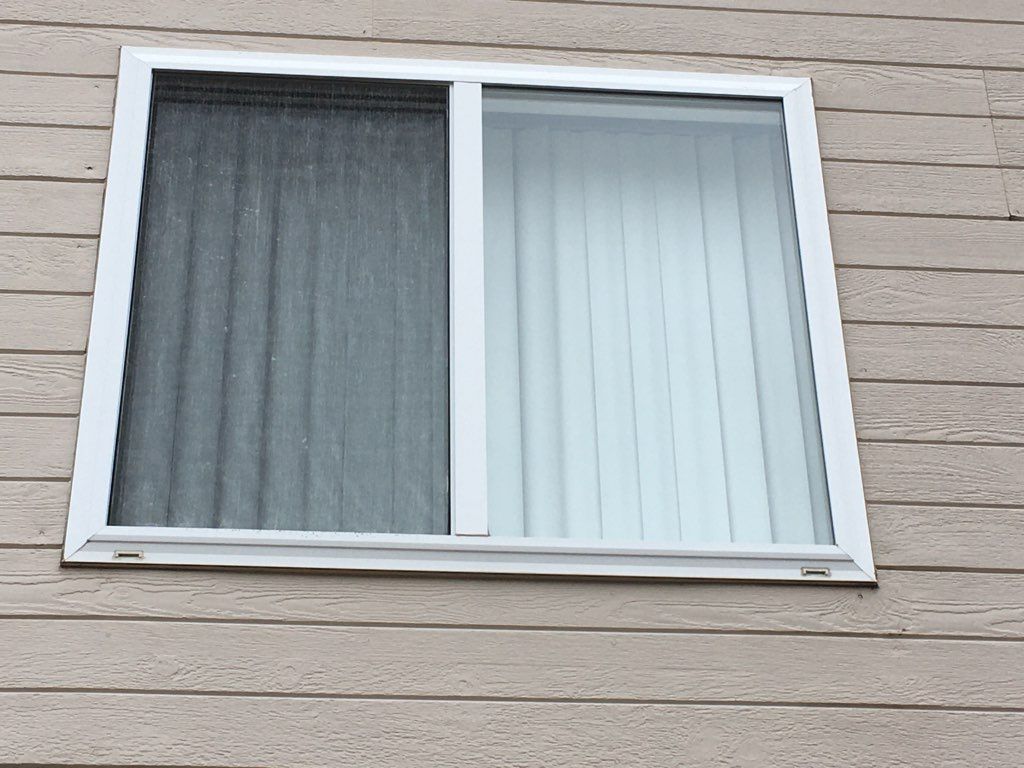 New Installed Siding Window — Milliken, CO — First Point Construction