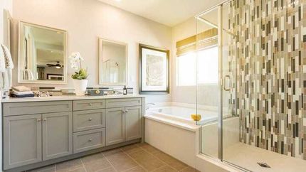 Modern bathroom shower vanity and bathtub by Huntsville Bathroom Pros
