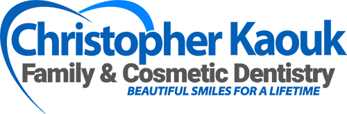 Logo for Christopher Kaouk Family & Cosmetic Dentistry with a blue heart design.