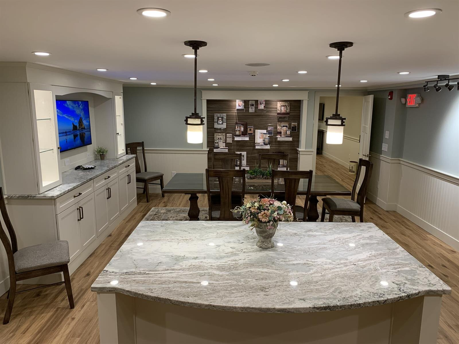 There is a large island in the middle of the room.