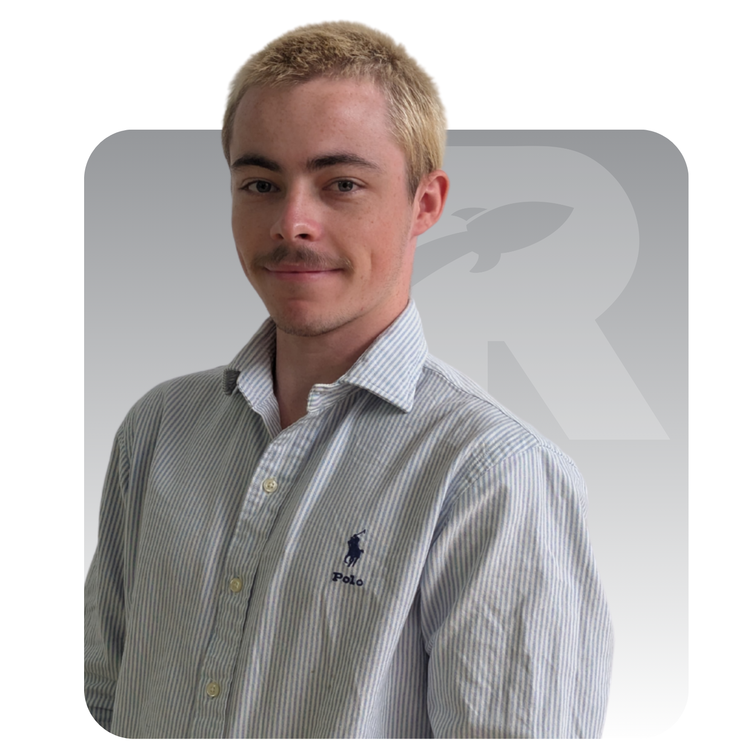 Portrait of a man in a striped button-up shirt against a white background with a faint logo