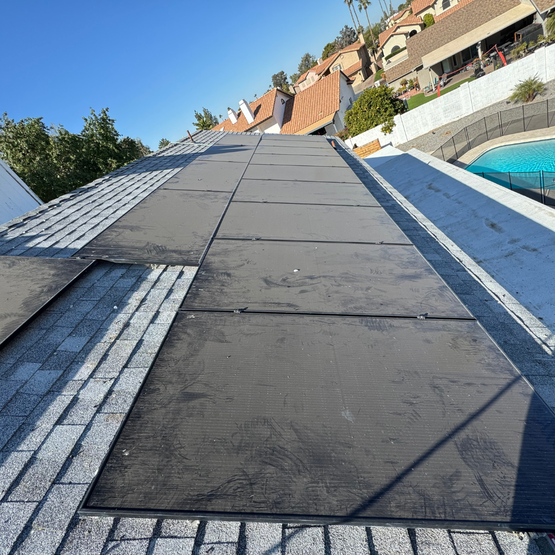 Looking up at a roof with a pool in the background
