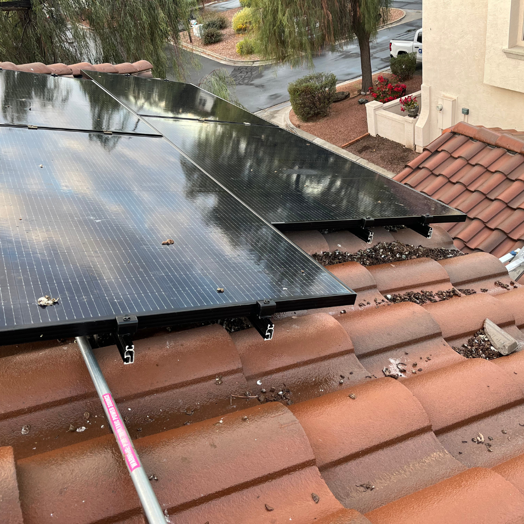 A roof with a lot of solar panels on it