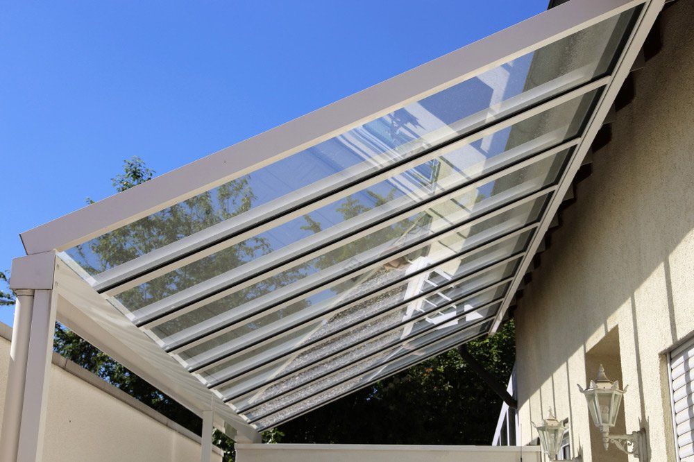 Courtyard Canopy With Glass — Gates & Fencing in Coffs Harbour, NSW