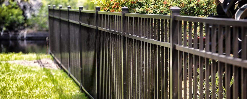 Black Aluminium Fence — Gates & Fencing in Coffs Harbour, NSW
