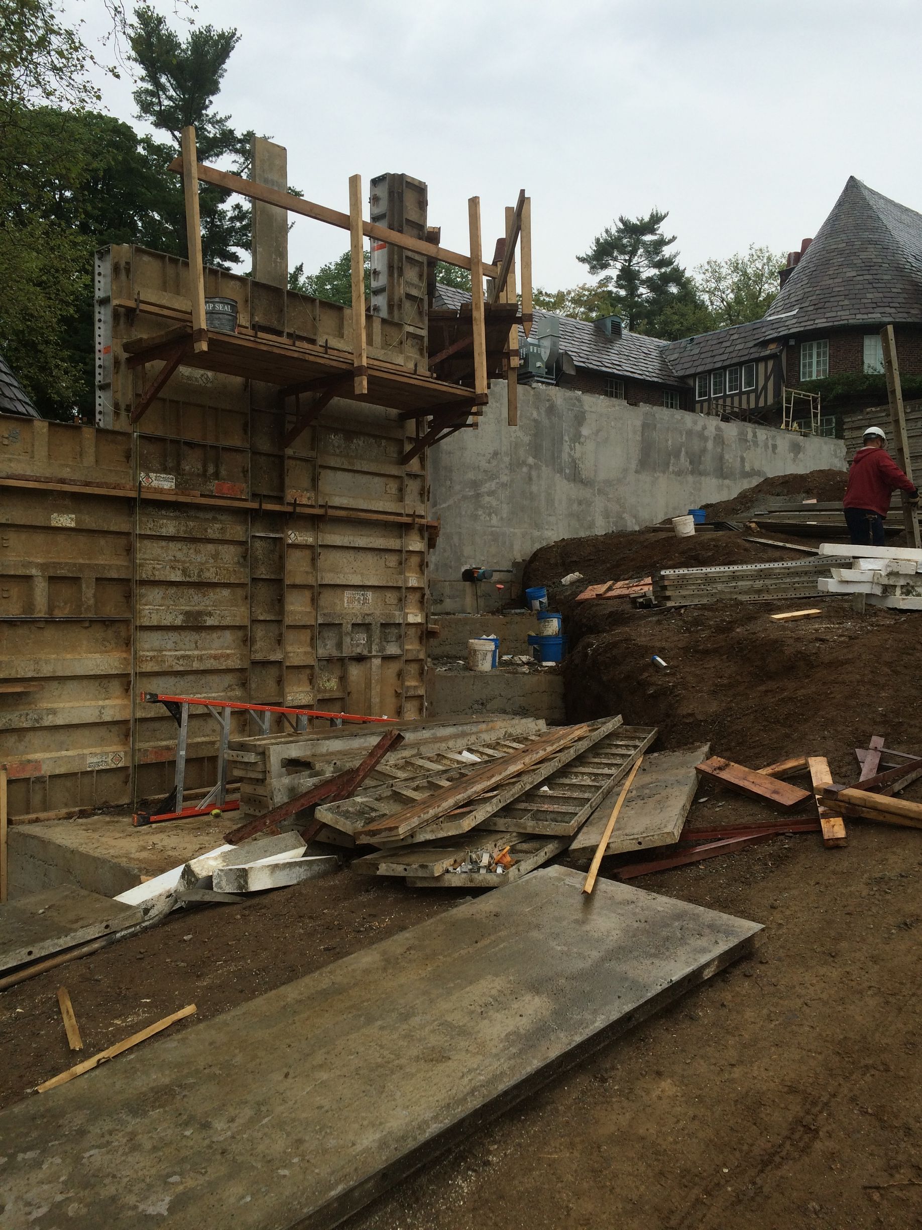 a construction site with a lot of dirt and concrete .