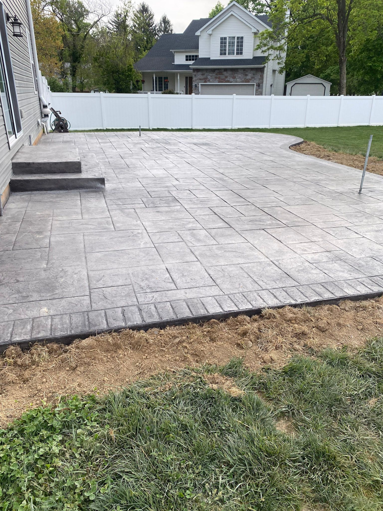 a  stamped concrete patio installation