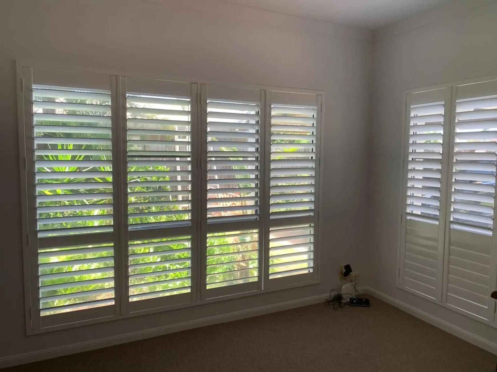 A Room With a Lot of Windows and Shutters on Them — Mi-ekka Designs in Bowen, QLD