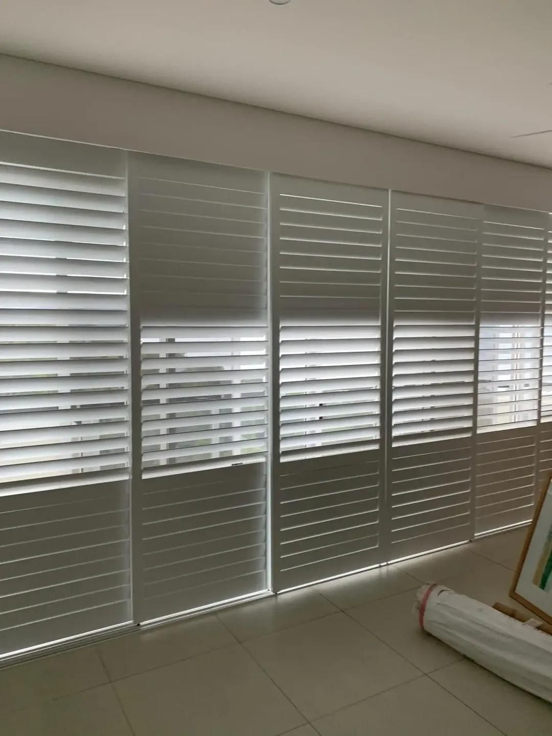 A Room With a Lot of Shutters on the Windows — Mi-ekka Designs in Cannonvale, QLD