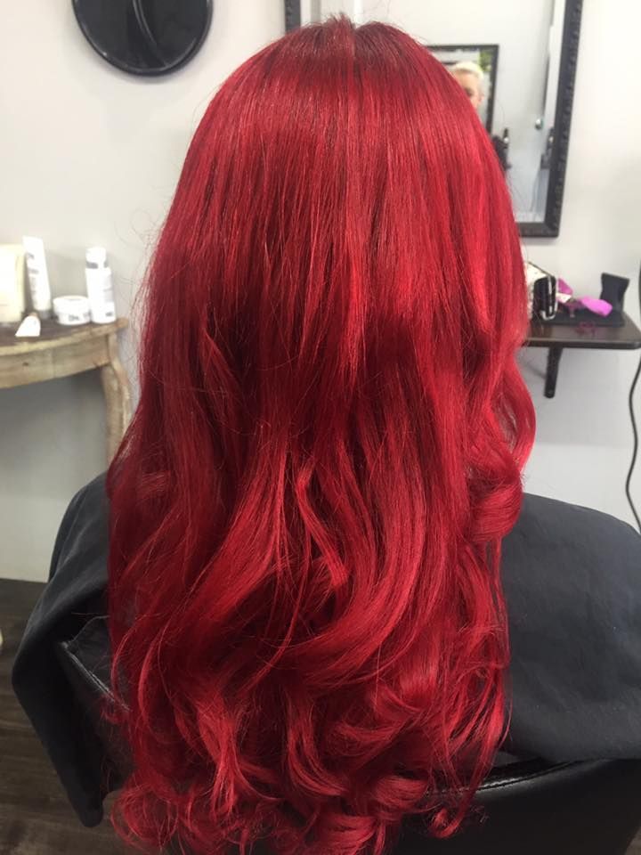 A Woman With Long Red Hair — Cut Loose Haircare Outlet in Lennox Head, NSW