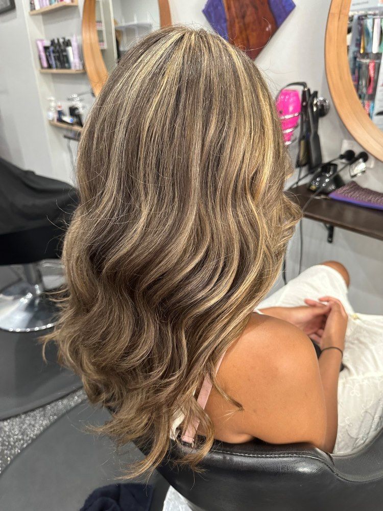 A Woman With Beautiful Flow In Her Hair — Cut Loose Haircare Outlet in Evans Head, NSW