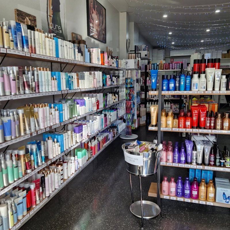 A Store Filled With Lots Of Shampoos And Conditioners — Cut Loose Haircare Outlet In Lismore, NSW