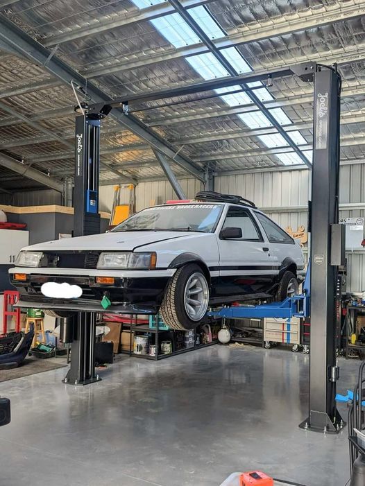 white car installing on pot