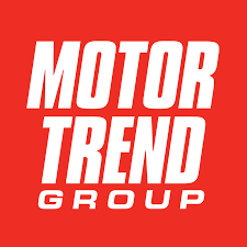 A red background with white text that says motor trend group
