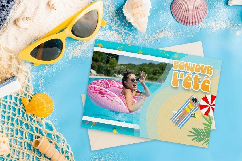 Une carte de voeux avec une photo d'une petite fille soufflant dans un pissenlit.