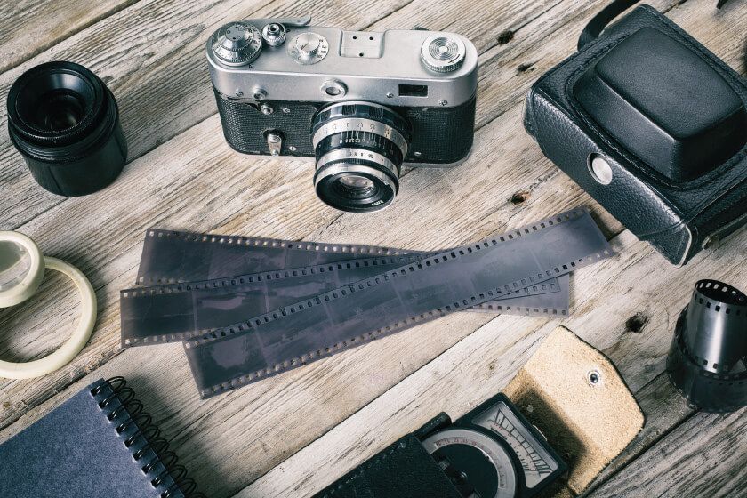 A camera and some other items on a table