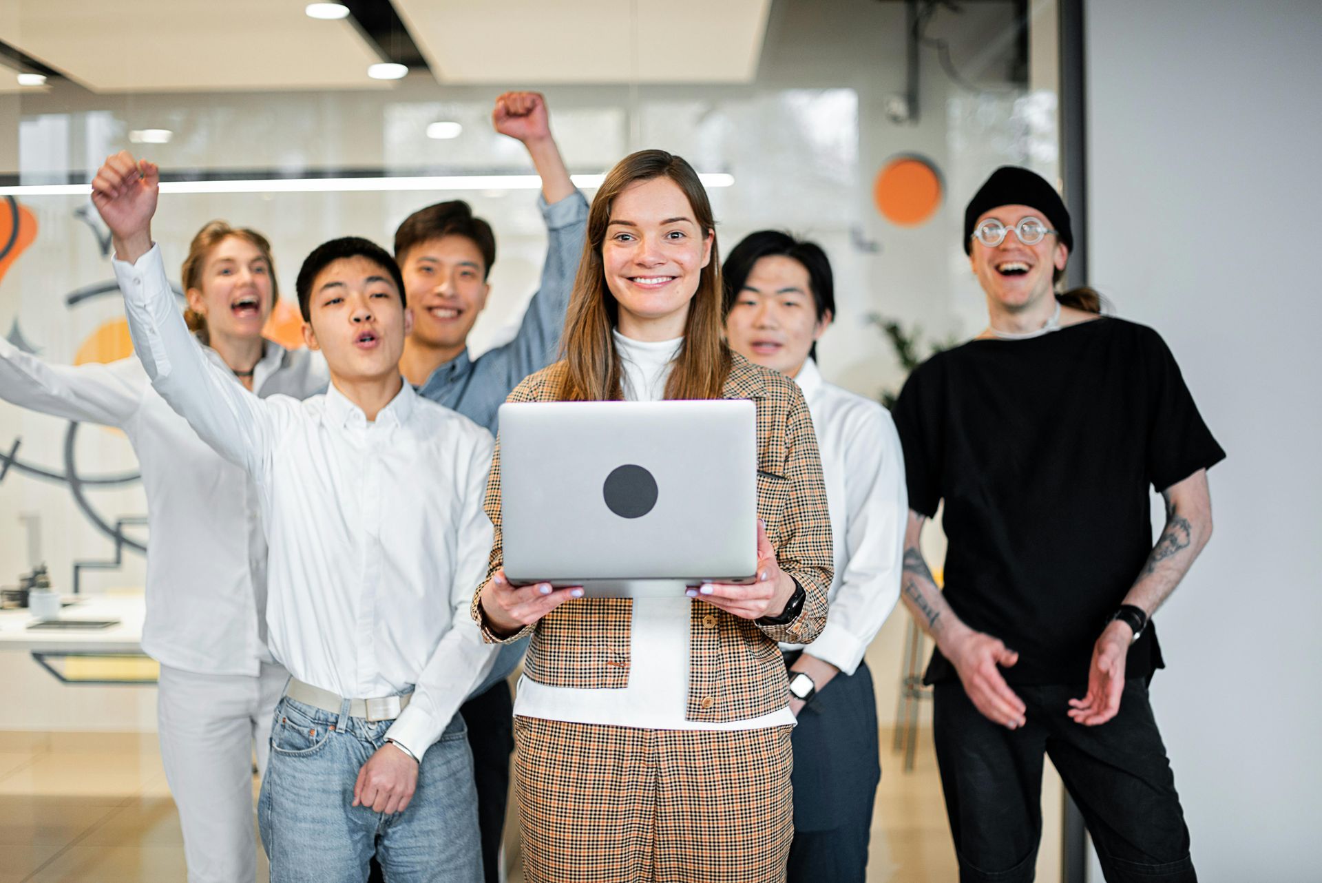 Professionals smiling during a collaborative conversation
