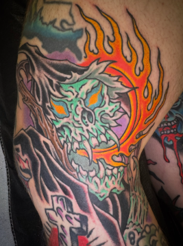 Reaper and flames tattoo by artist J Ranno at Absolute Art Tattoo