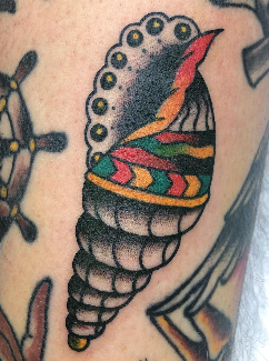 Traditional American conch shell tattoo by artist Keith Harper
