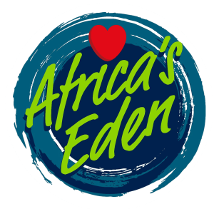 Logo for Africa's Eden: Green script over a blue circle with a red heart on top.
