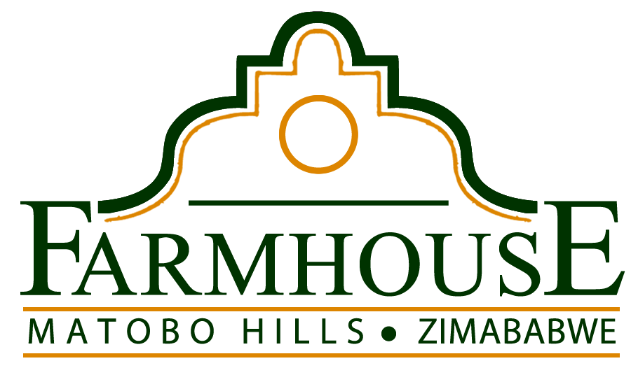 Farmhouse Matobo Hills, Zimbabwe logo. Green and gold lettering, decorative top arch.