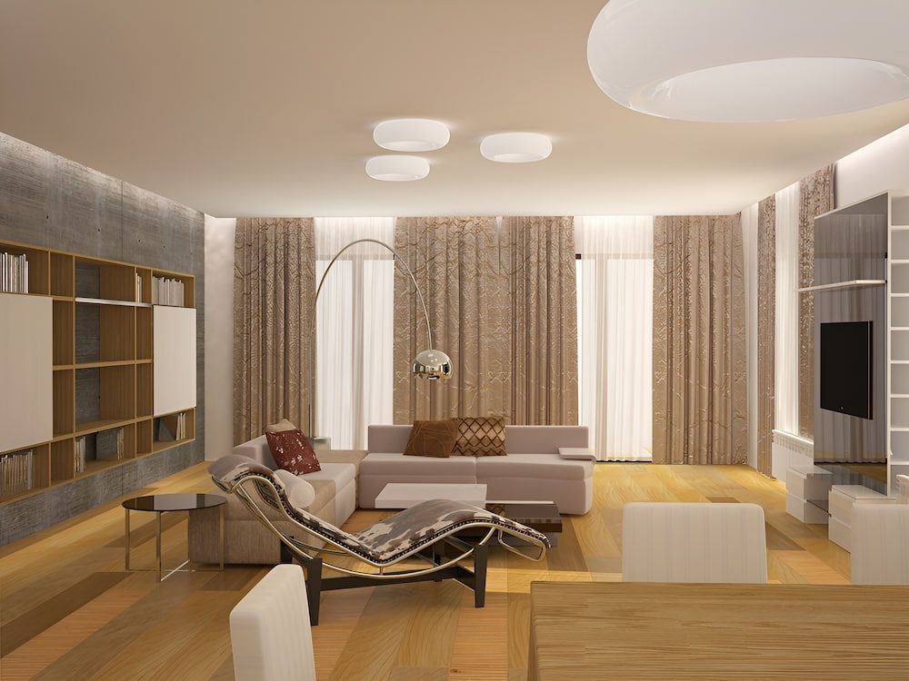 A Living Room With A Couch, Chair, Table And Television — In-Line Electrical Southern Highlands in Marulan, NSW