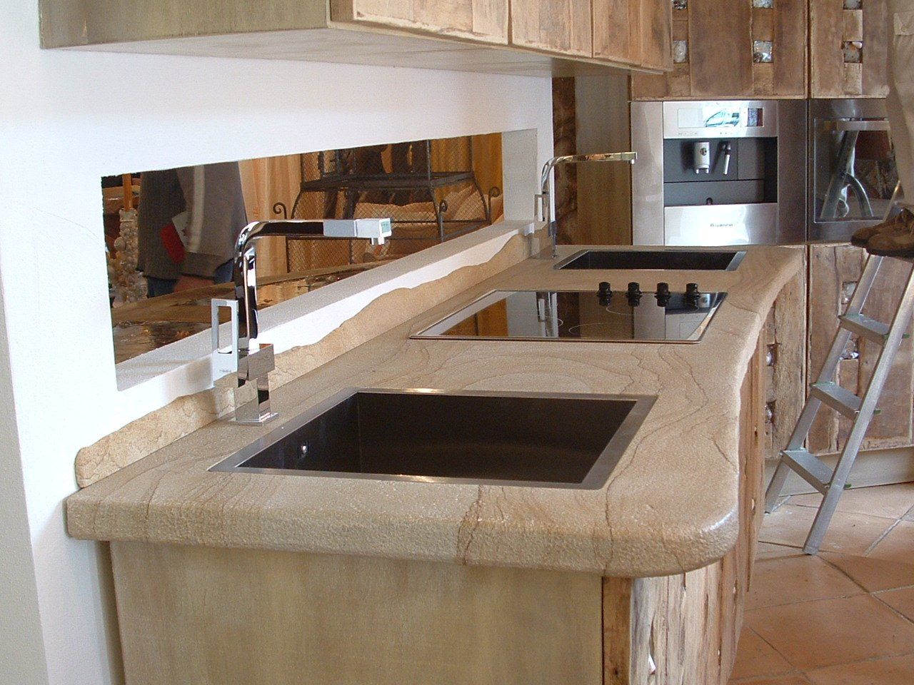 Catini e piani di cottura in marmo