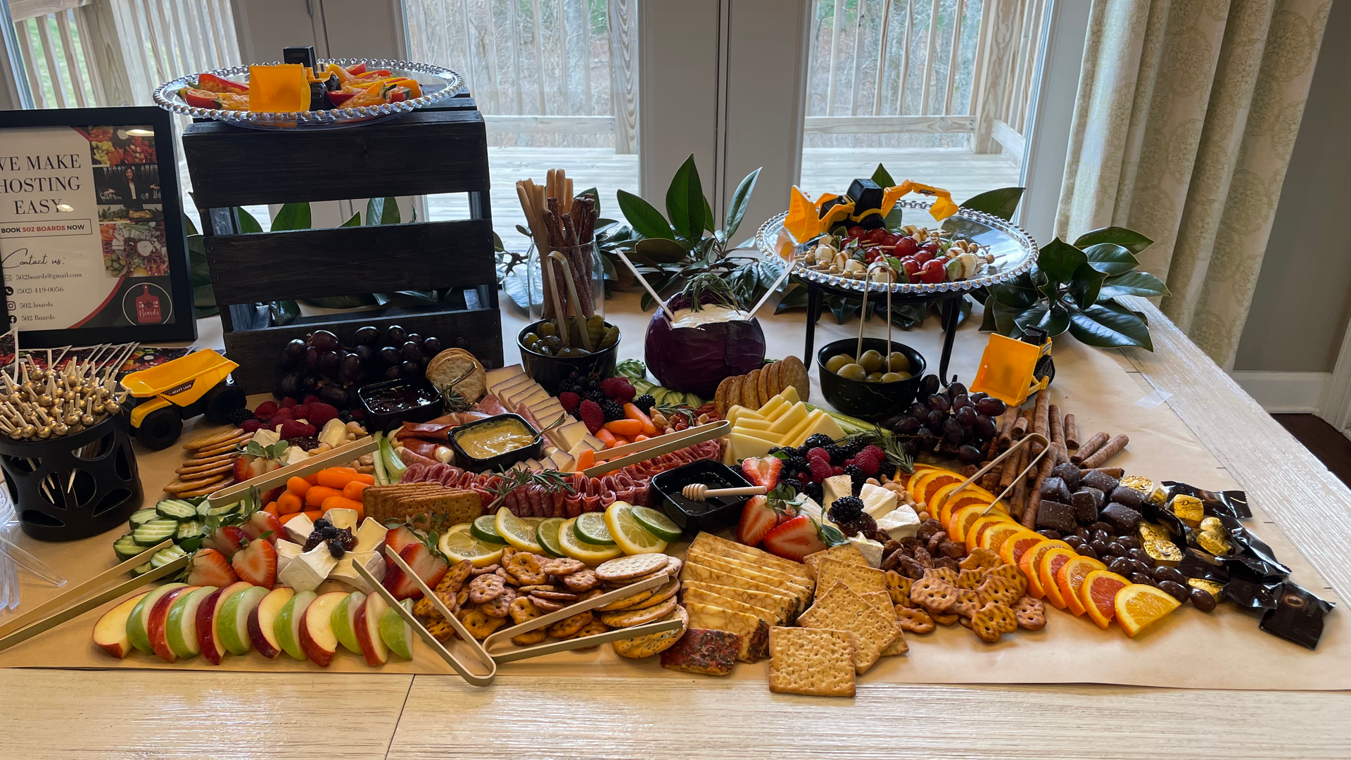 A wooden table topped with a variety of fruits and vegetables.